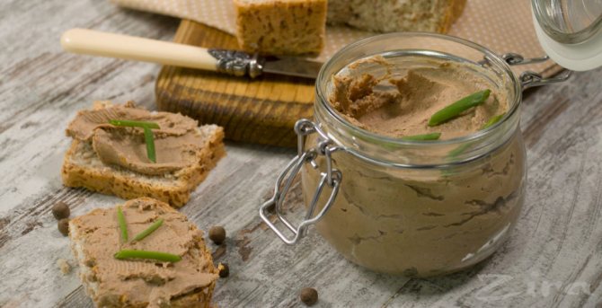 Liver pate in a jar and two liver pate sandwiches