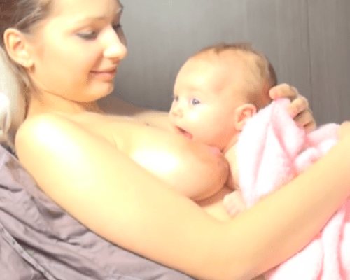 attaching a baby while breastfeeding