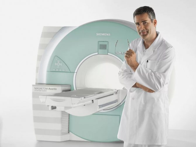 Doctor near MRI machine